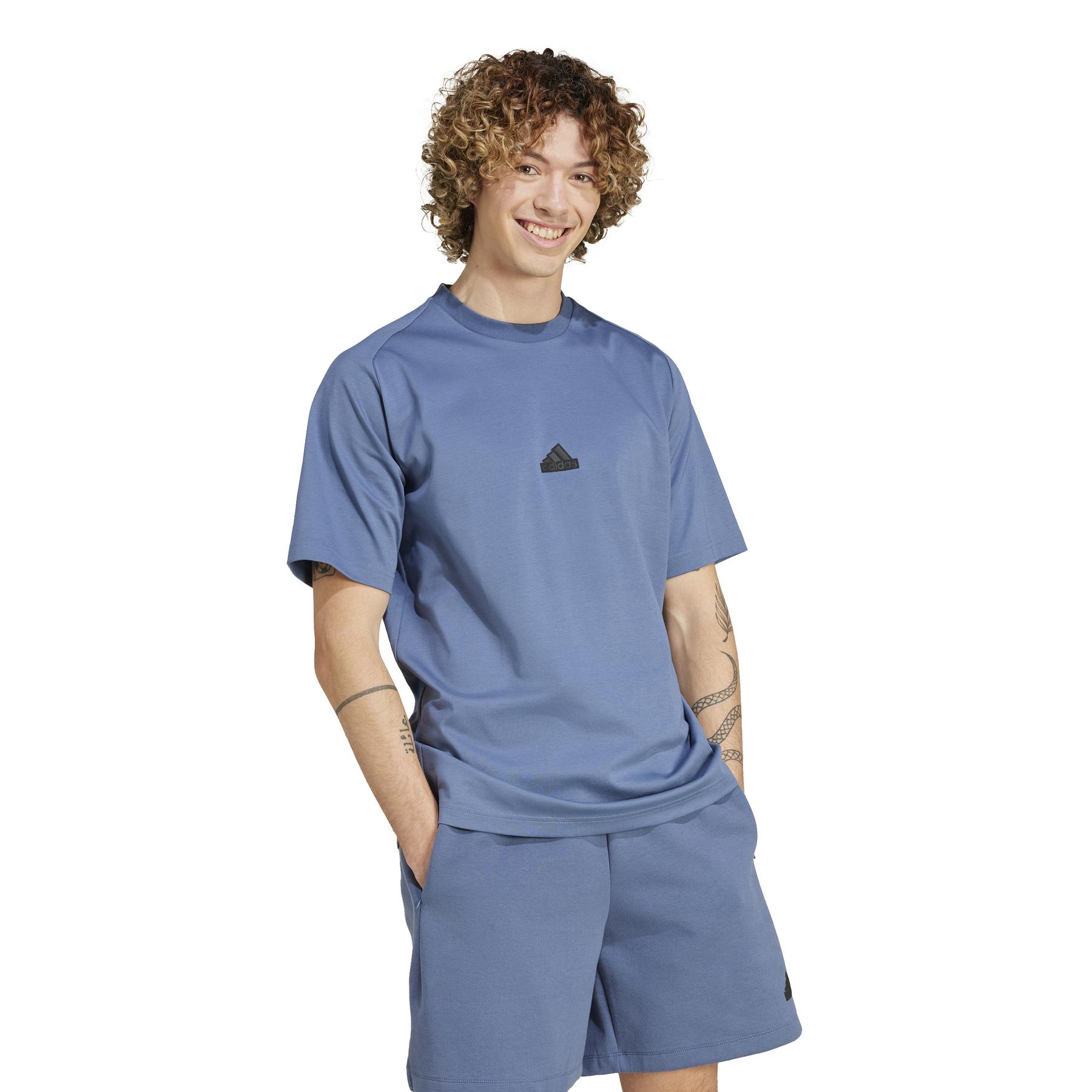 product/a/d/adidas_ir5234_6_apparel_on_model_walking_view_white.jpg
